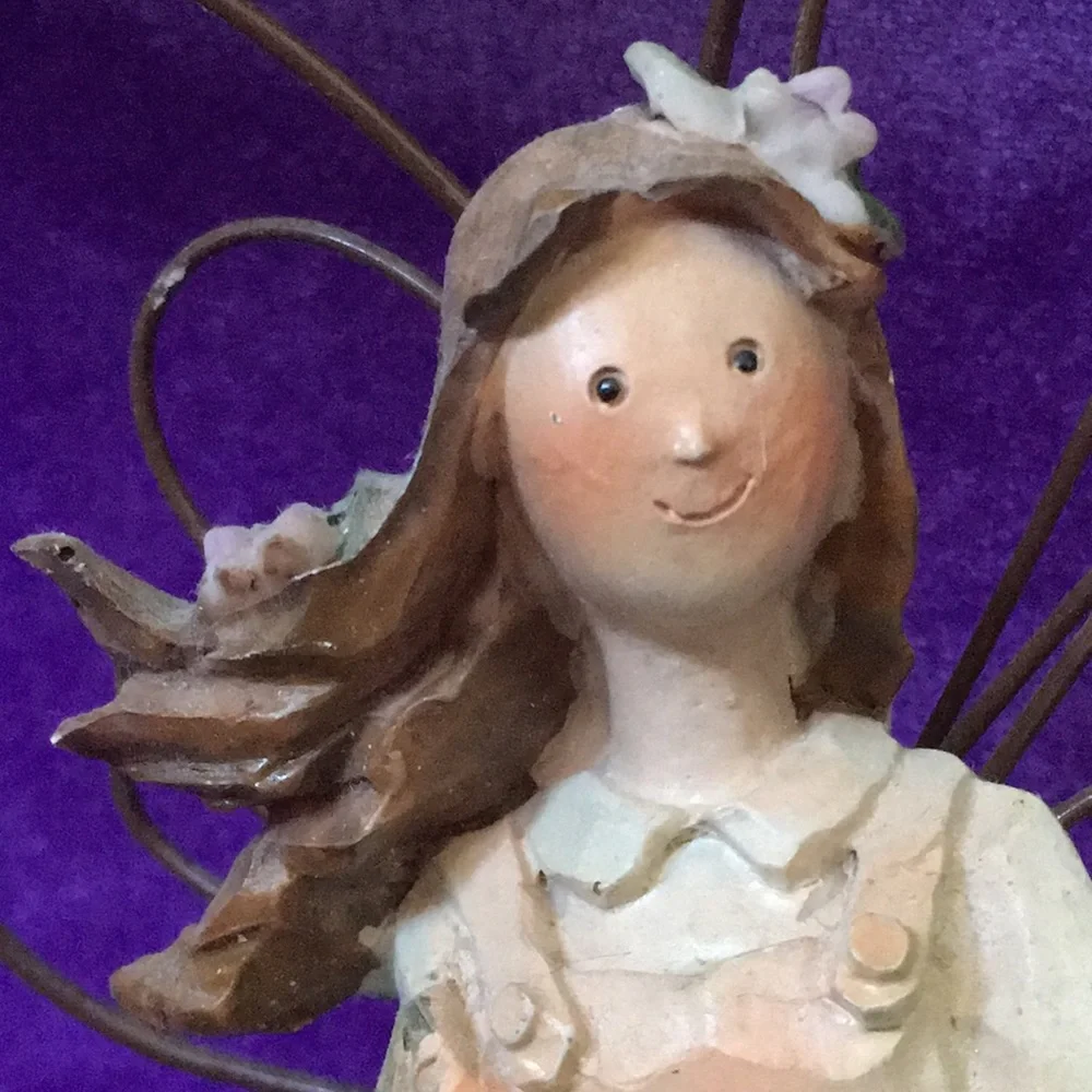 Resin Angel Holding Basket of Flowers
